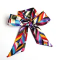 Silky satin ribbon with colorful geometric zig-zag pattern tied in a bow - S60-Multi Color Zigzag Geometric