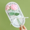 Handmade pink crochet roses with green leaves on white display card with ribbon - Rose (Nude + Light Pink)