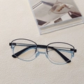 Detailed close-up of premium black metal and acetate semi-rimless oval glasses frames - Black Frame Clear Lenses