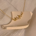 Elegant gold butterfly necklace featuring three sparkling white zircon butterfly pendants - Multiple Butterflies Style