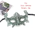 Detail view of a green lace fox mask with golden embroidery for Halloween cosplay - Fox - Green