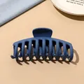 Macro shot of large matte deep blue hair claw clip with multi-tooth design on beige background - Dark Blue Matte-Keel