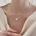 Detailed view of silver double-layer necklace with pearl pendant on model neck - Crushed Silver Snake Bone Double Layer Pearl Style (6# Necklace-Silver)