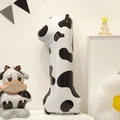 Detail of 40-inch cow print number 1 foil balloon with cartoon cow for party decor - Cow Pattern Style 1