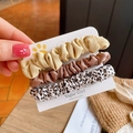 3-piece set of fabric scrunchies in beige, brown, and leopard print on display card - Coffee Combo
