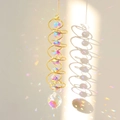 Macro detail of golden spiral tail with crystal prisms casting vibrant rainbow light spots - Gold Spiral AB Color Crystal Ball
