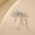 Silver bow pendant with cubic zirconia inlay showing dimensions 2.5cm by 1.8cm - Flower Style MYYX00633 / Silver