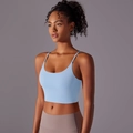 Close-up of light blue yoga crop top with thin straps and smooth elastic fabric - S / Baby Blue