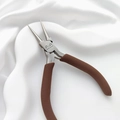 Macro detail of jewelry round nose pliers with brown non-slip handle for DIY wire looping - Round Nose Pliers