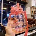 Pink large-capacity water bottle with straw, time markings, and carrying strap - 1300ml Pink Dual Drink Basic