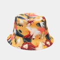 Detailed view of bucket hat with vibrant cartoon lion and floral illustration prints - M (56-58cm) / Lion Pattern Reversible