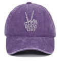 Detailed white embroidery of a skeleton hand and Good Vibes on purple washed cotton cap - Adjustable / Purple