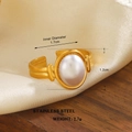 Gold plated stainless steel open ring with a large oval white pearl and wavy texture - Wide Wave Oval Large Pearl Style (ZN1503-1172)