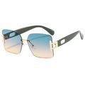 Gafas de sol cuadradas sin montura con lentes degradadas azul-naranja y detalles en metal dorado - Montura Dorada Lentes Verde Amarillo