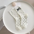 Mid-calf cotton socks in creamy white with black polka dots and a black ribbon bow - One Size / White Polka Dot