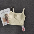 Beigefarbenes Sport-Camisole mit Polstern und LYCRA-Gewebe für hohe Dehnbarkeit - S / Cremegelb
