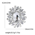 Silver vintage rhinestone brooch with large oval glass stone and crystal floral design - Silver