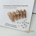 Macro shot of 2x3mm champagne trapezoid nail rhinestones on long ballerina fake nails - Champagne Trapezoid 2x3 (XY-1017)
