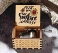 Hand-cranked wooden music box with You are My Sunshine print and sunflower detail - Khaki Two Flowers