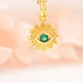 Macro shot of gold sun evil eye pendant with a green zircon stone on a fine O-chain - K303 Dark Green Eye Pendant Only (Without Chain) (ZYN-DMK303G)