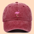 Vintage washed cotton baseball cap featuring a pink flamingo embroidery in maroon red - Adjustable / Burgundy