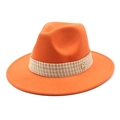 Detail of orange wool fedora featuring black and white plaid band with golden M buckle - Orange