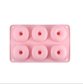 Rosa Silikon-Donut-Backform mit 6 Mulden, rechteckig, auf schlichtem weißem Hintergrund - 6 Löcher / Rosa