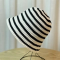 Women's Japanese style bucket hat featuring classic black and white striped knit pattern - Fine Stripe Beige