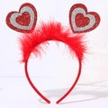 Macro detail of red sequin heart headband with soft feather trim for festive party wear - Style 15 Heart (Red & Silver Heart + Feather)
