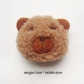 Detailed close-up of 5x6cm brown teddy fleece bear plush accessory for DIY clothing crafts - Brown Bear