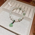 Close-up of elegant French style beaded bracelet with pearls and green lucky charm - 6# Natural Stone Lotus Pod Pendant Bracelet