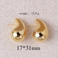 Polished gold teardrop earrings measuring 17x31mm and weighing 12.5g on beige background - Medium / Gold