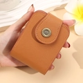 Brown Saffiano mini makeup bag with built-in mirror and golden sunflower snap button - Brown
