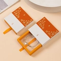 Orange and white drawer-style jewelry box with green woven bracelet and gold foil stamping - With Orange Inner Box / 9*9*2CM / Grass White