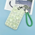 Green plaid card holder featuring cute frog illustrations with matching green woven lanyard - Grid Frog + Green Wrist Rope