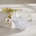 Creative cat paw acrylic liquid keychain with golden ring and pearl pendant decoration - Luminous Pearl Paw Style / White