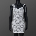Detailed close-up of white floral lace texture and sheer mesh on a slim bodycon dress - S / White