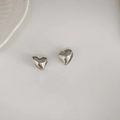 Minimalist silver heart-shaped drop earrings with a polished metallic finish - Silver Heart Ear Buckle