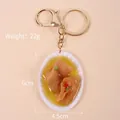 Realistic mini dumpling food keychain with realistic broth and golden metal ring charm - Oval Plate - Large Intestine / Gold 8-shaped Clasp