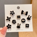 Set di 10 spille in smalto nero e oro con forme di fiori e coniglietti da donna - Stile Numero e Fiore Oro Nero