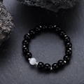Minimalist black beaded bracelet with a translucent white moonstone and silver spacers - Obsidian Style (S865-A)