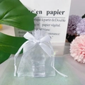 Mini white organza drawstring gift bag with ribbon bow and clear cube inside - White