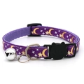 Detail of purple nylon pet collar with gold moon star patterns and silver bell - Purple
