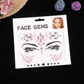 Set di gemme per il viso rosa e argento per trucco con varie forme di strass su fondo nero - Rosa