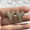 Elegant gold heart stud earrings with sparkling pave-set crystals shown in hand - Large Gold