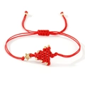 Handmade woven red cord bracelet featuring a gold star and Christmas tree design - Christmas Tree Braided Hand Rope (X-B24090401B) / Red