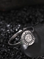 Macro detail of silver stainless steel star ring on stone with sun pattern engraving - Pentagram Style (NR307)