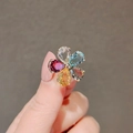 Exquisite gold-plated flower ring featuring colorful pear-cut opal stones on hand - Colorful Flower (40206C)