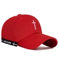 Classic red cotton baseball cap featuring white cross embroidery and black ribbon strap - Red
