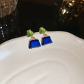 Elegant floral drop earrings with blue and green crystals on a ceramic display - Green Triangle Blue Trapezoid Geometric Studs (36#)
